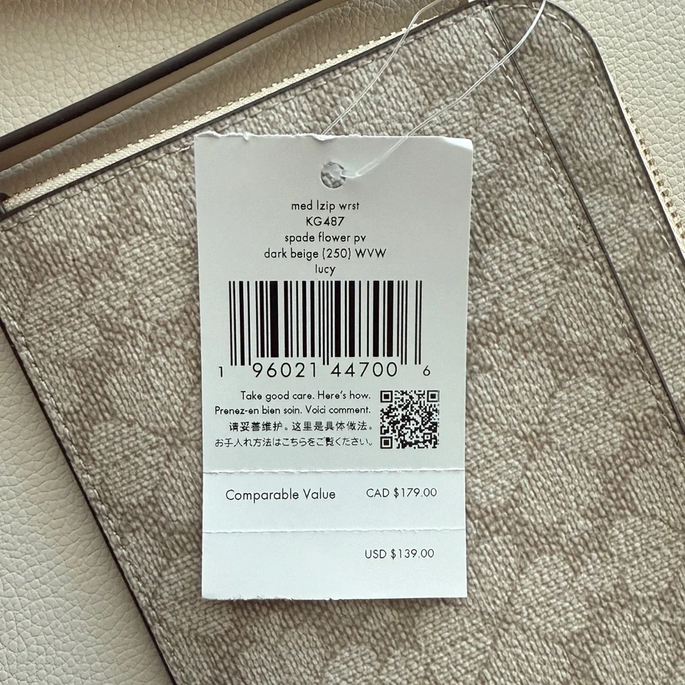 NWT Kate Spade Lucy Flower Medium Zip Wristlet in Dark Beige KG487